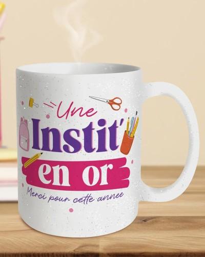 Mug à paillettes Une instit’ en or